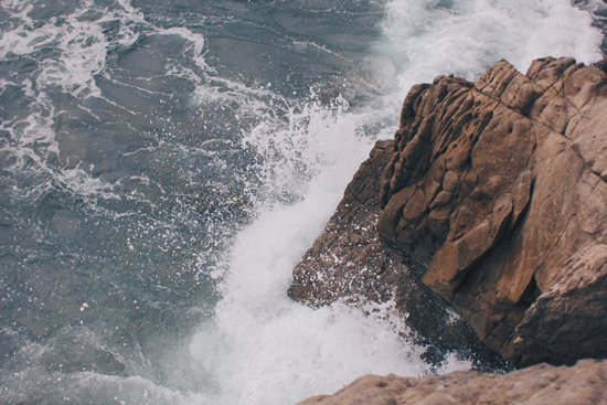 waves crashing on rocks