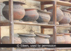 clay pots on shelves