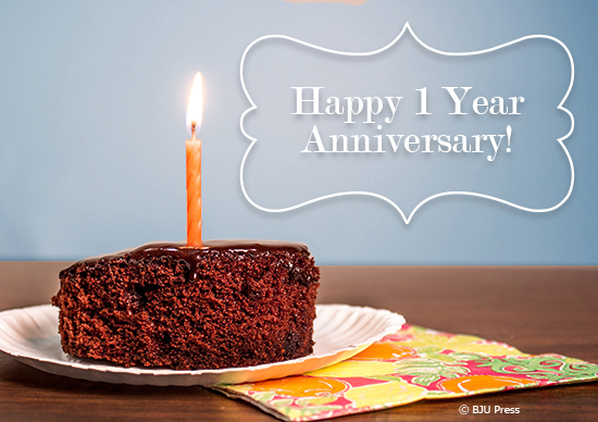 image of a cake with one candle in it repersenting BJU Press blog's one year anniversary