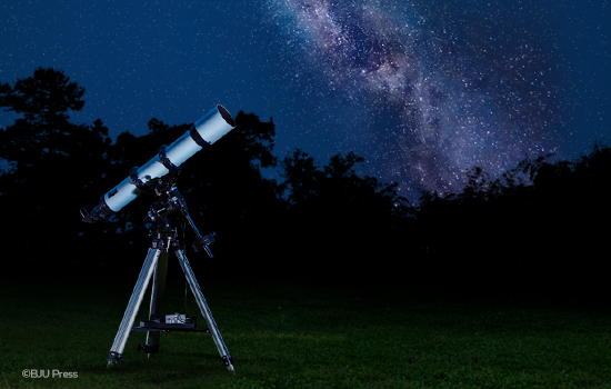 telescope outside in backyard on starry night