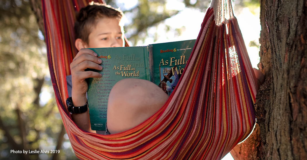 boy reading in hammock for creative thinking